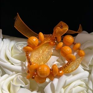 Set of two orange stretchy beaded bracelets